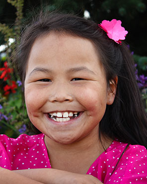 Young patient smiling outdoors